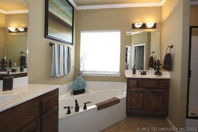 The luxury master bath is spacious with double van