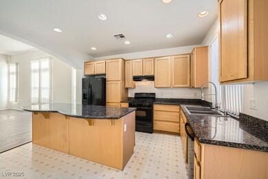 Kitchen with Island & Dining Area