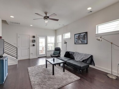 Living area featuring plenty of natural light, ce