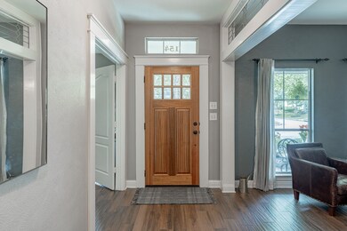 Entry opens to study and dining room, with a view