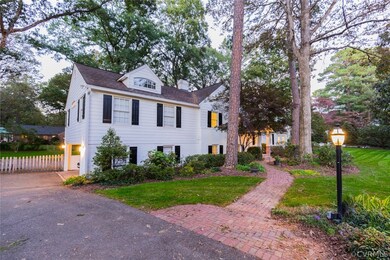 The side driveway leads to the carport, side parki