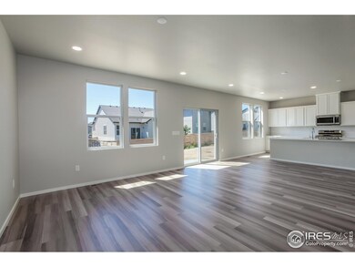 LIVING ROOM, DINING AND KITCHEN