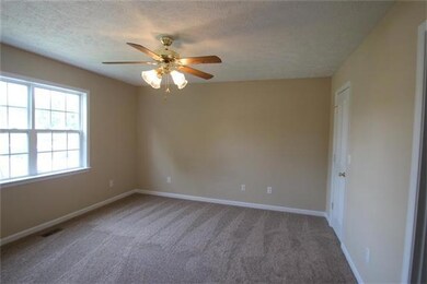 Large master bedroom has walk in closet and full bath.