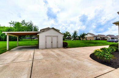 Storage building with Carport great for RV or boat parking!