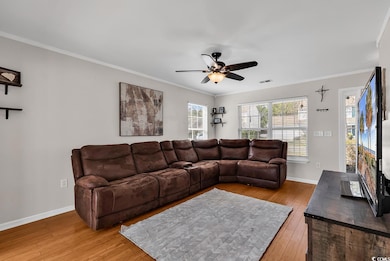 Living room with hardwood / wood-style floors, orn