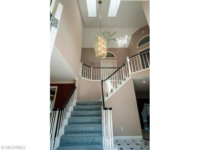 Full view of the staircase with skylights.