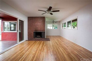 Living room. Sliding doors to covered, tiled patio