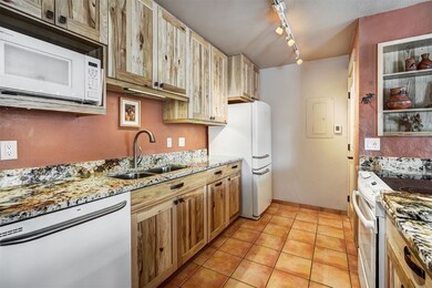 Remodeled kitchen with custom hickory cabinets, am