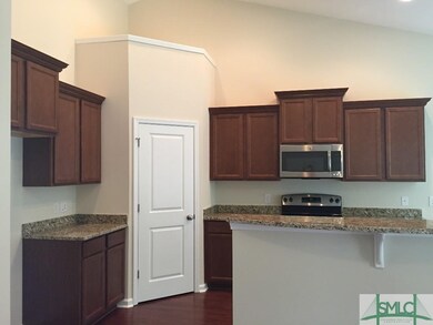 Open kitchen to the family room with huge vaulted 