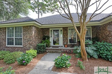 Enjoy the beautiful landscaping from the front por