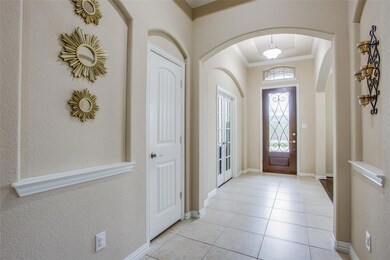 Lovely open and bright entry with 11 ft. ceilings!