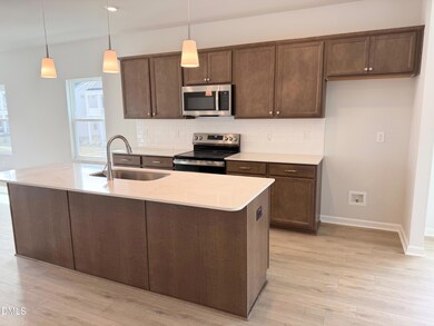 398 Chesapeake Commons St unit 124, Garner, NC 27529 - photo 2