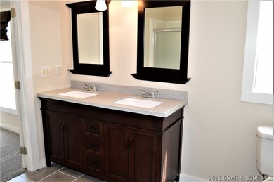 Custom vanity with double sinks and custom mirrors