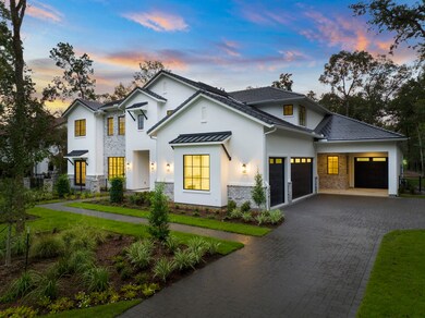 Luscious landscaping and mature trees around add p