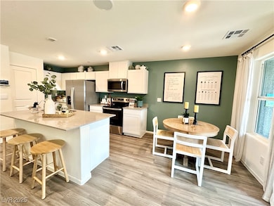 Kitchen with appliances with stainless steel finis
