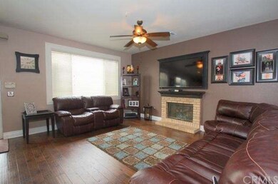 FAMILY ROOM WITH BEAUTIFUL ENGINEERED WOOD FLOORS