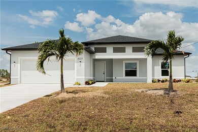 View of front facade with a porch and a garage