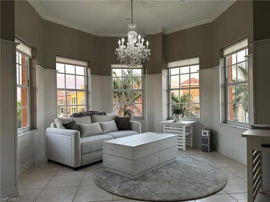 Den featuring plenty of natural light, ornamental 