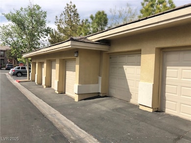 SUMMERLIN CONDO WITH A ONE CAR GARAGE TOO!