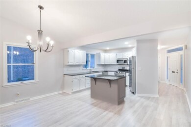Kitchen and view into foyer