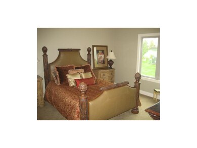 Spacious master bedroom has lots of room for large