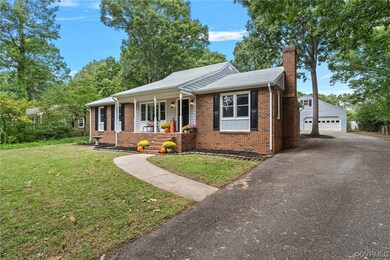 Ranch-style house with a porch, a front yard, and