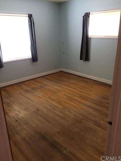 ONE OF THREE BEDROOMS