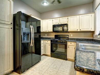 To the left of the SS sink is a new dishwasher. Th