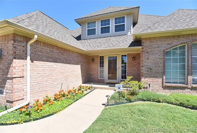 An inviting entry.  Full sprinkler system & gutter