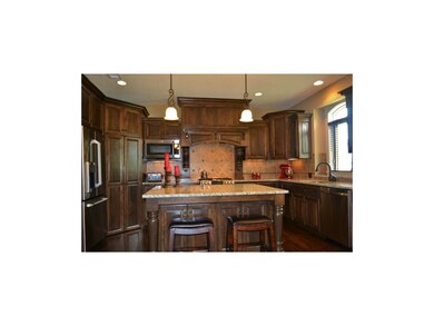 Custom cabinets, huge walk-in pantry, gas stove, s