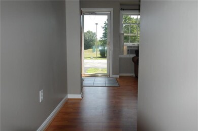 Front door leading to the living...