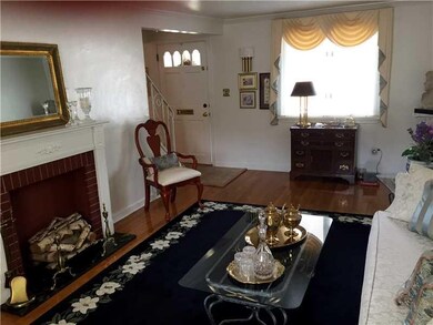 Living Room. Hardwood floors, decorative fireplace