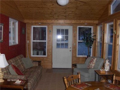 Family Room. Enjoy the beautiful back yard from th