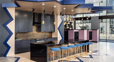 Kitchen with a breakfast bar area, decorative ligh