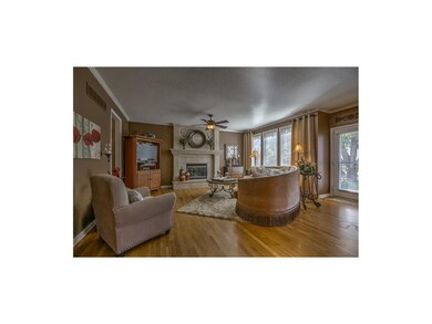 Gorgeous Great Room with Hardwood Floors & Custom 