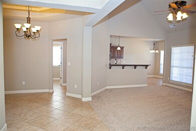 View from the hallway, living/dining/kitchen