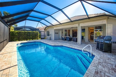 Outdoor pool with a ceiling fan, a lanai, and a pa