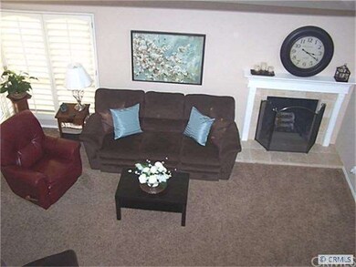 A View of the Living Room  showing new tumbled  tr