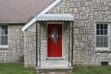 Love the red door! Shows personality!