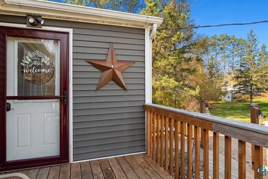 Entrance to property with a deck