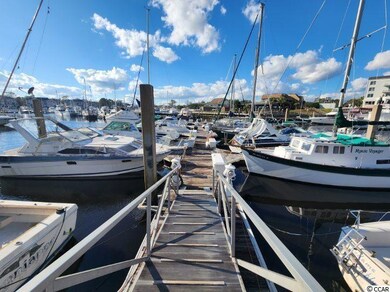 4208 Coquina Harbour Dr unit E-12, Little River, SC 29566 - photo 3