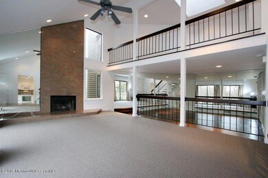 view of living room, dining room & loft