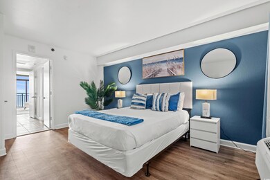 Bedroom with wood-type flooring