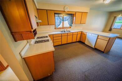 Gas Stove, Vented Hood, Dishwasher included