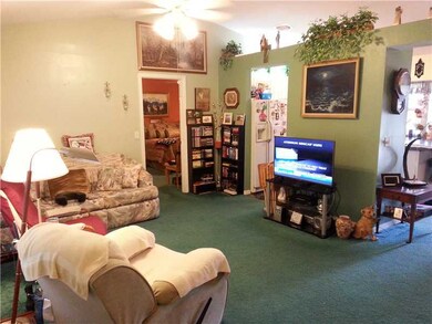 Living Room. Great room concept,offers vaulted cei