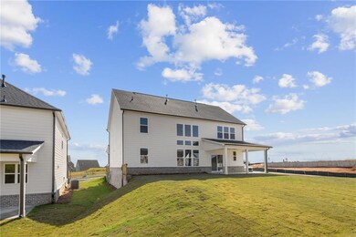 Rear view of house with a patio area