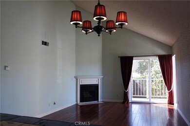 Open floor plan living and dining rooms.   Private balcony with new sliding glass door.