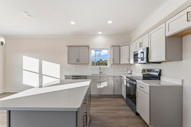 Enjoy the view of the neighborhood's front pond while doing dishes!