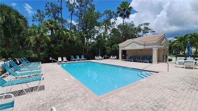 Community pool with a patio area