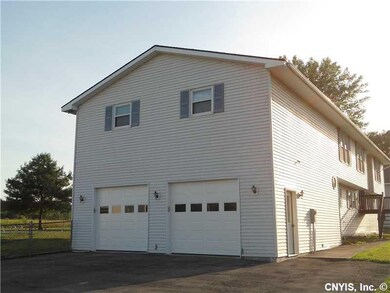 Exterior Front. Very large two stall garage!